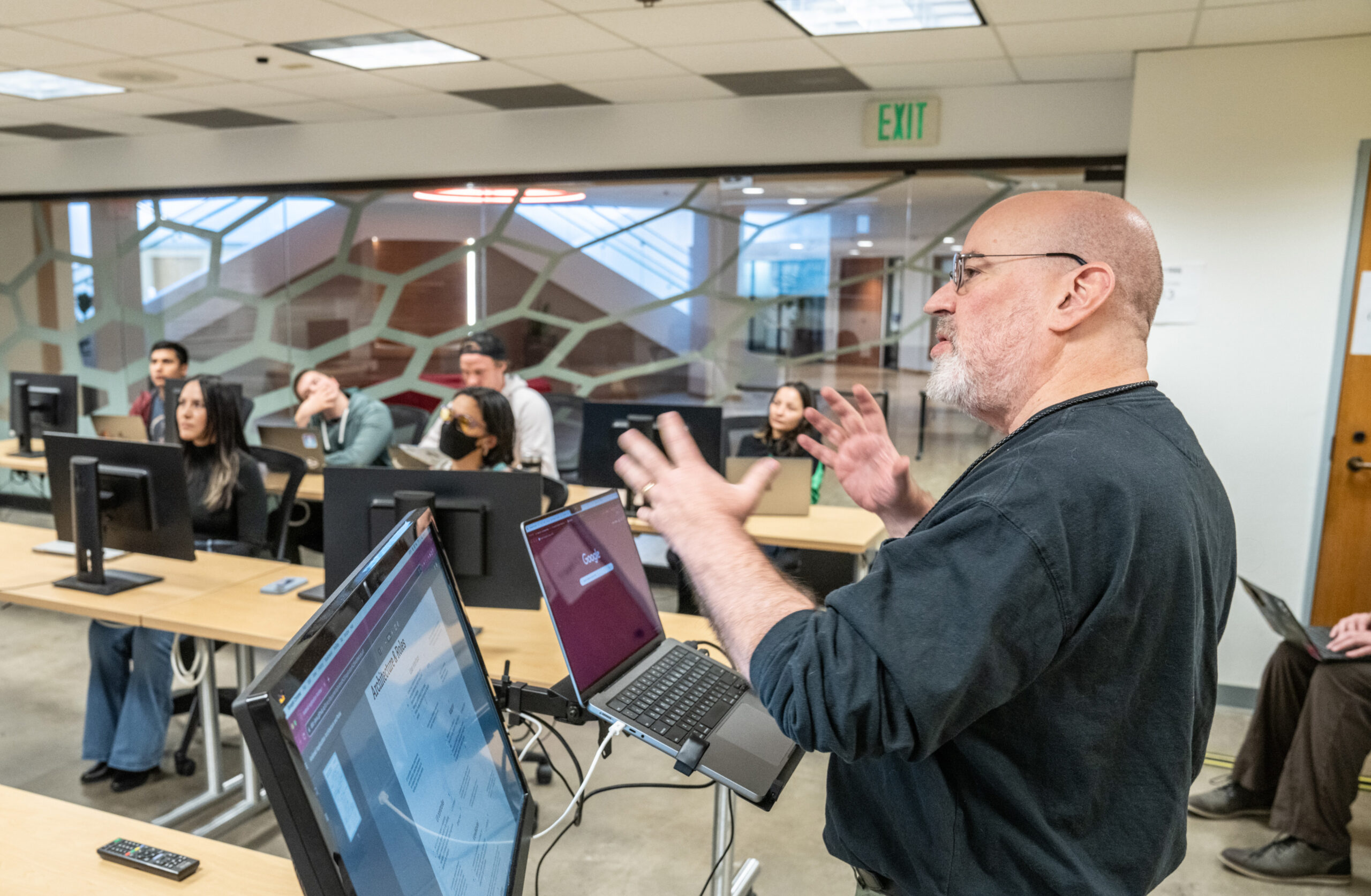 Deep Div Java + Android instructor Nick Bennet teaching students about software engineering, JavaScript, and app development